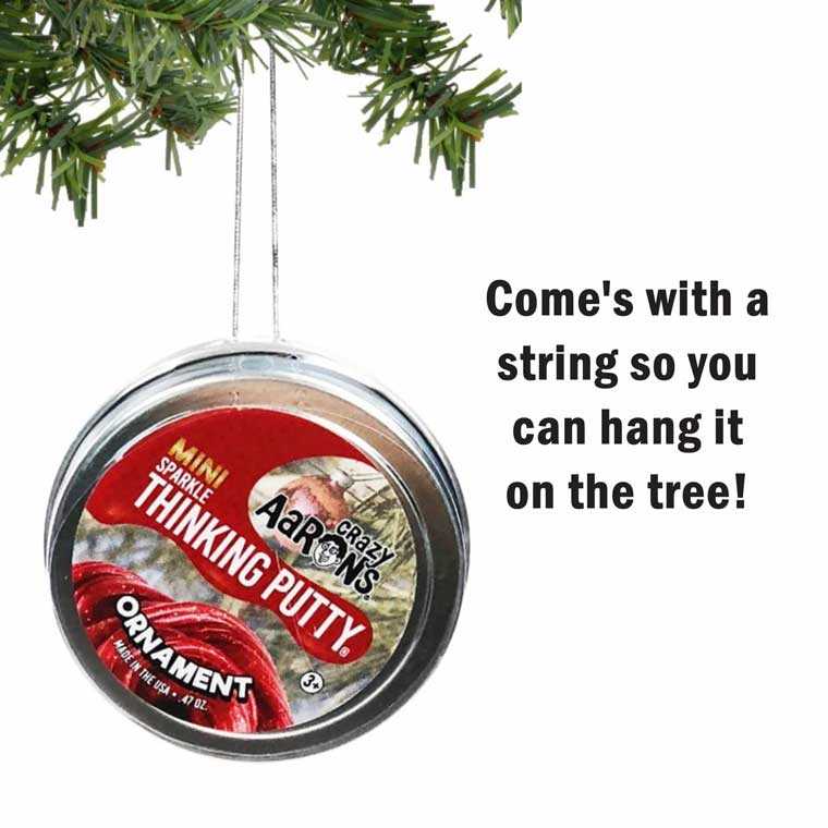 Mini tin of Ornament Thinking Putty® with the words: Come's with a string so you can hang it on the tree.