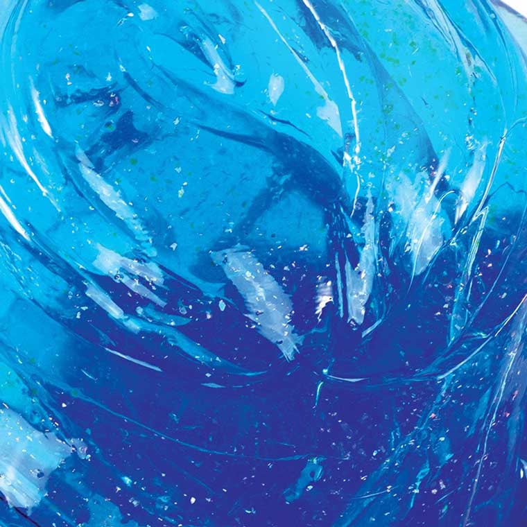 Close up texture of clear blue putty.