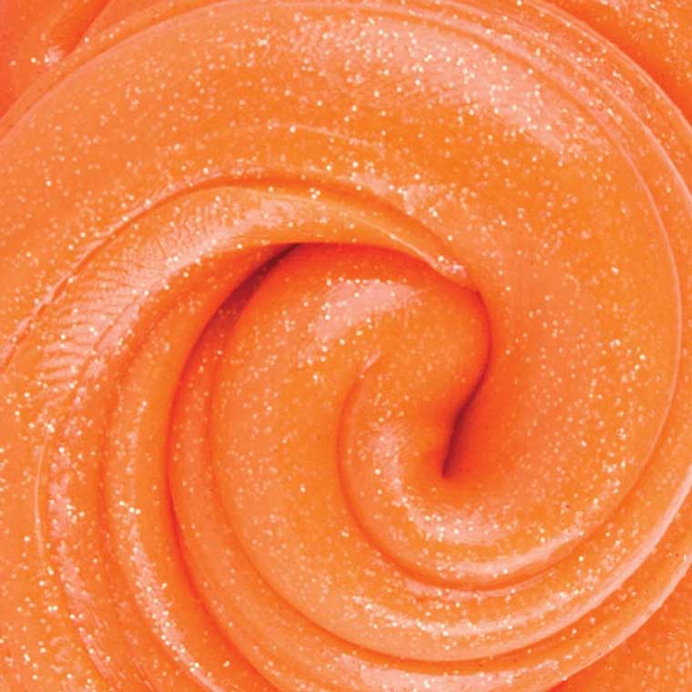 Close up detail of sparkle orange putty.
